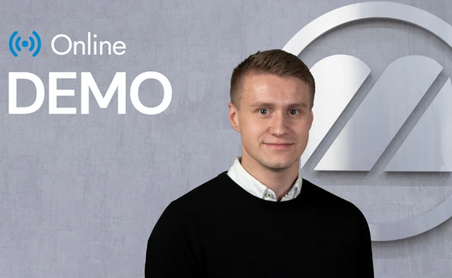 A man standing in front of a logo.