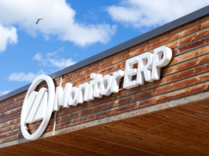 A sign of Monitor ERP on the side of the Monitor ERP headcourter in Sweden, Hudiksvall