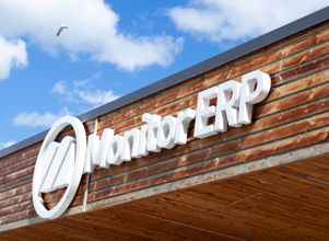 A sign of Monitor ERP on the side of the Monitor ERP headcourter in Sweden, Hudiksvall