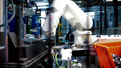 A robot that is standing in a room.
