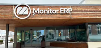 A sign of Monitor ERP on the side of the Monitor ERP headcourter in Sweden, Hudiksvall