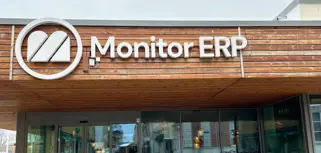 A sign of Monitor ERP on the side of the Monitor ERP headcourter in Sweden, Hudiksvall