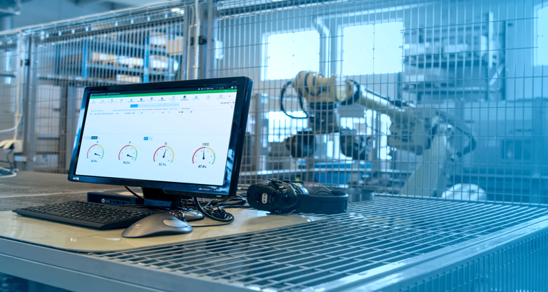 A desktop computer sitting on top of a metal table.