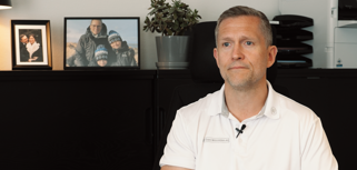 Mikael Vetterskog, CEO of Fårbo Manufacturing sitting at a desk in front of a computer.