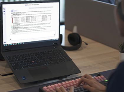 MAiA AI Assistant in Monitor ERP displaying manufacturing order analysis and recommendations on a laptop screen.
