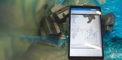 A computer tablet displaying drawings.