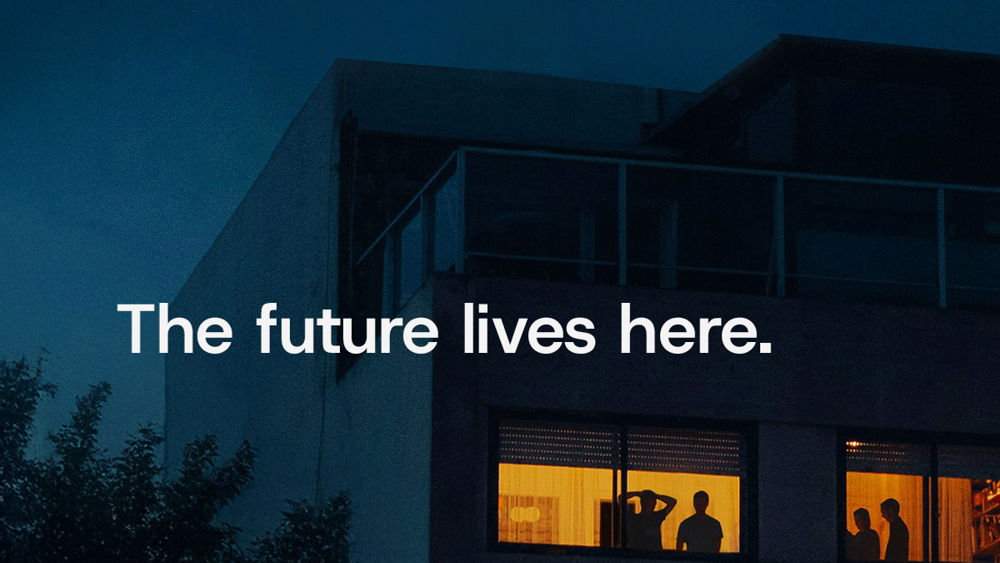 A building with people looking out of the windows.